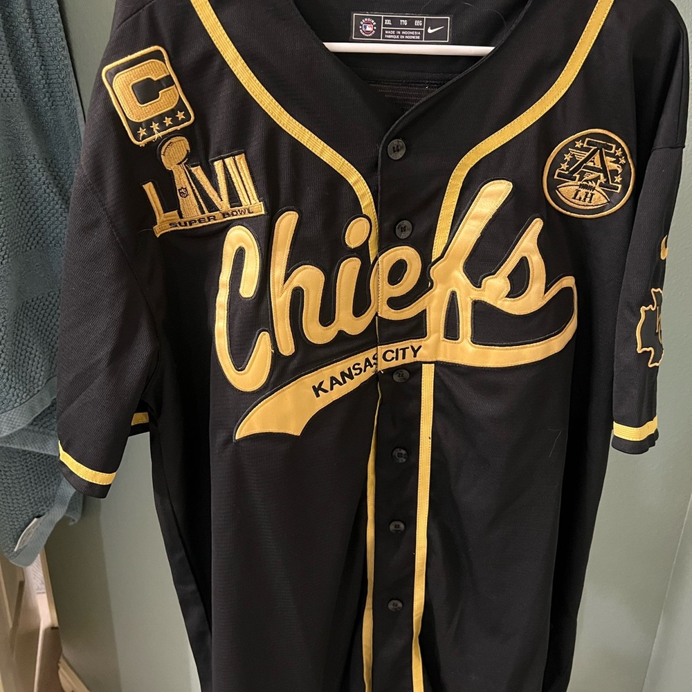 Genuine Merchandise Black and Gold Apparel